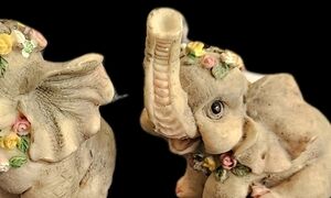 Set Of Two Vintage Anthromorphic baby elephant figurines w/flower crown wreath.
